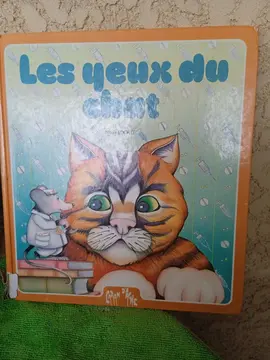 Livre les yeux du chat