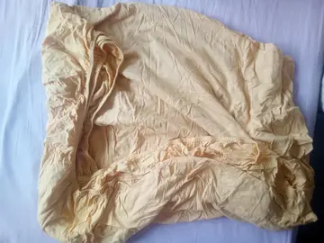 drap usagé mais pouvant encore servir