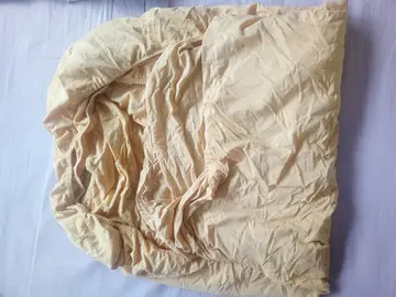 drap usagé mais pouvant encore servir