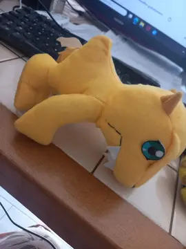 peluche dragon jaune