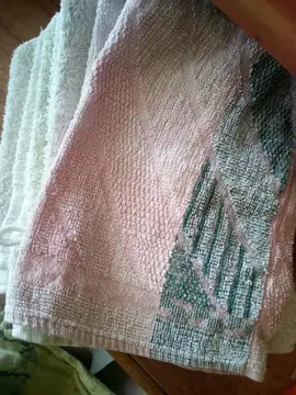 gants de toilette usagés mais encore utilisables