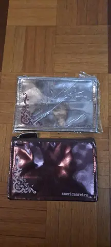 2 pochettes neuves