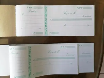 carnet de reçus quasi neufs