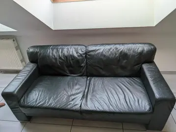 canapé et fauteuil en cuir noir