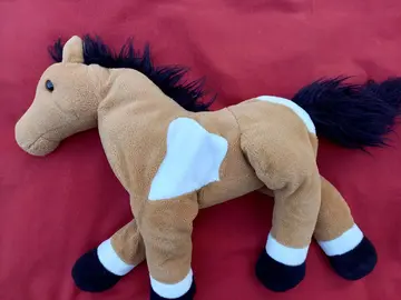 Grande peluche cheval