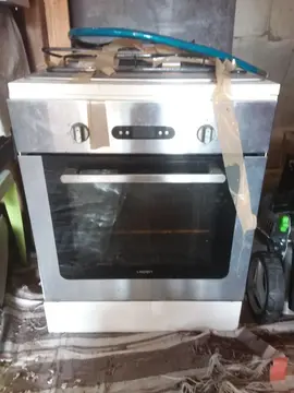 cuisinière maison 4 feux gaz et four électrique
