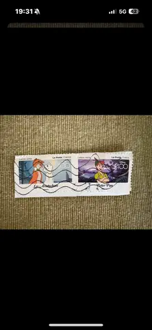 timbre Disney 100 ans / Bien lire l’annonce pour la réponse
