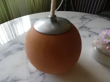Bougeoir décoratif Orange et métal.