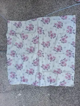 une taie d'oreiller en coton motif fleur