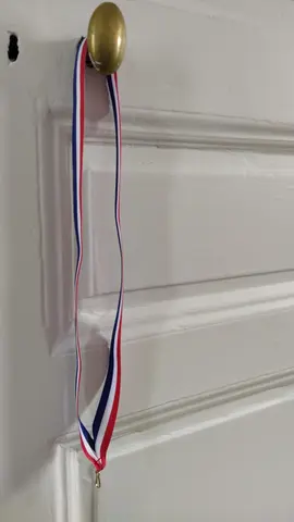 Cordon à médaille