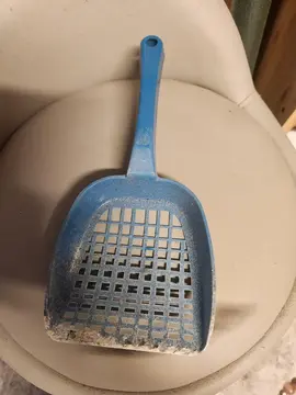 pelle à litière pour chat