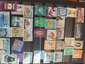 2 pages uniques timbres Egypte...