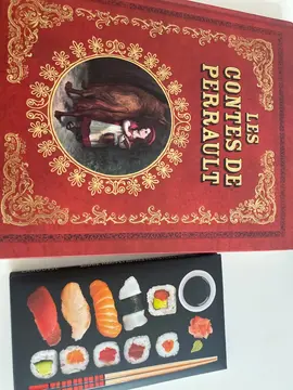 très beau livre des contes de Perrault et un livret de recette de sushis