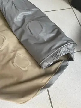 matelas gonflable percé