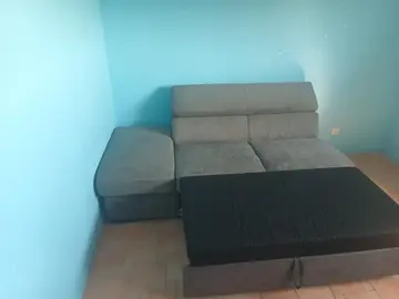 côté de canapé d'angle avec couchage