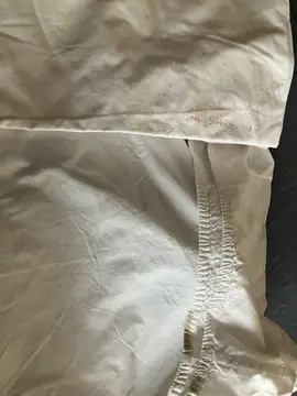 drap housse coton blanc 1 personne avec une série de tâches qui résistent Au lavage,