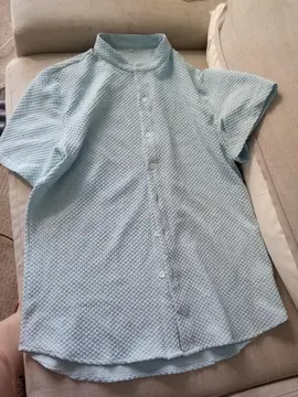 chemise en très bon état Bleu claire