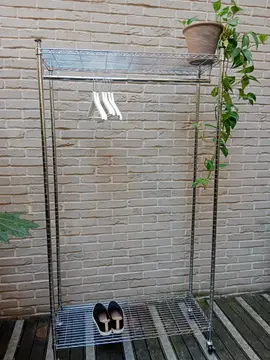 Portant à vêtements à roulettes