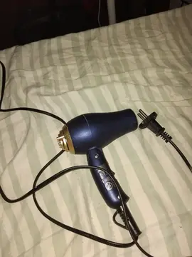 sèche cheveux de voyage très peu servi