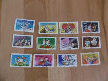 Série 12 timbres Bonne année toute l'année 2014