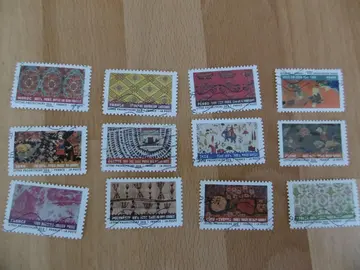 Série 12 timbres Tissu du monde 2011