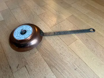 poele décorative avec baromètre