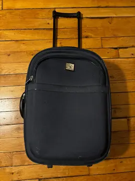 Valise à roulettes bleu