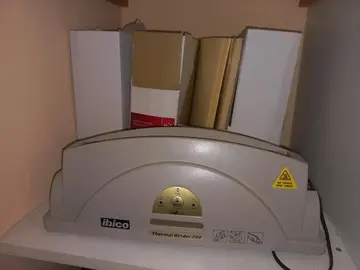 Machine à relier + reliures