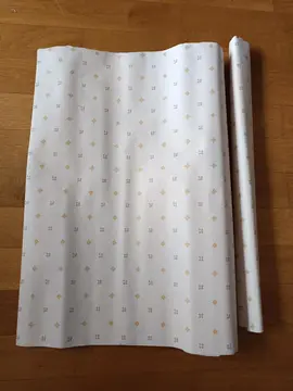 un rouleau de tapisserie +chute