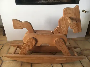 cheval de bois à bascule