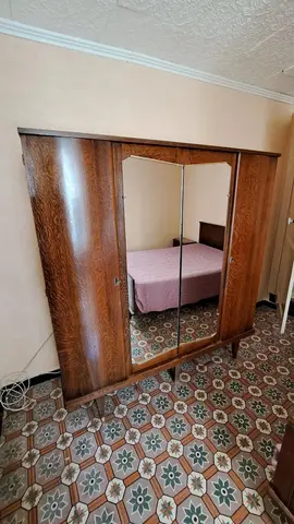 Donne armoire 4 portes bois Vintage