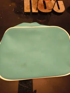Trousse de toilette bleu clair très bon état