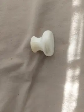 1 petite poignée de tiroir