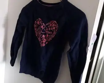 Pull bleu marine très bon état laver taille 10 ans