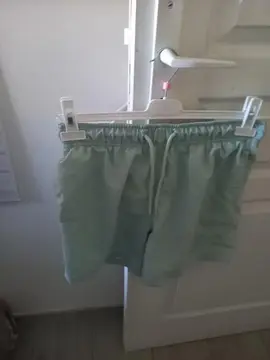 Short de bain très bon état laver couleur vert menthe pour homme adulte taille s