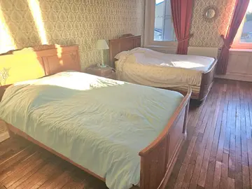 2 lits en bois
