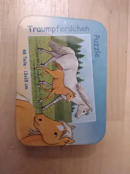 mini puzzle dans boîte en métal