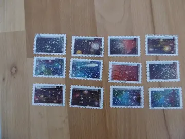 Série 12 timbres Tutoyer les étoiles 2021