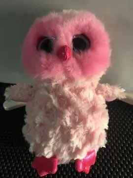 Petite chouette rose en peluche