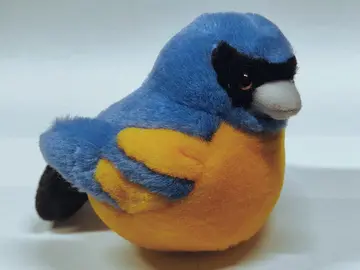 Peluche oiseau chantante