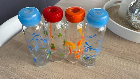 4 biberons en verre