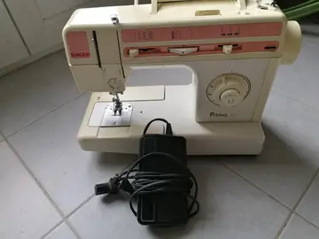 Machine à Coudre Singer à réviser