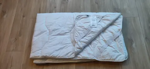 Surmatelas 120cm*190cm, très peu utilisé