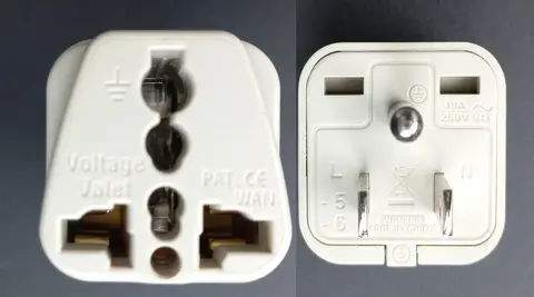 Adapteur fiches UK/EU vers prises US (avec terre)