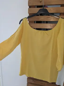 haut du bras dénudé taille L