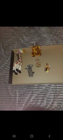 ensemble petites peluches girafe