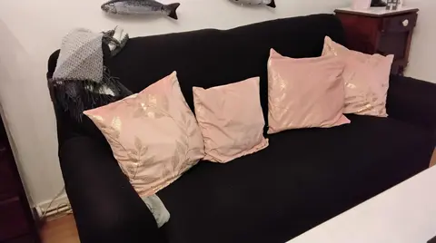 canapé lit ,ancien rouge,avec housse noir