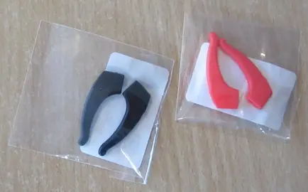 2 paires de Bloques lunettes en silicone (1 rouge photo + 1 no ) et (1 noir)NEUFS (sur les branches)