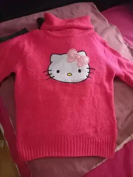 pull col rouler T4/5 ans