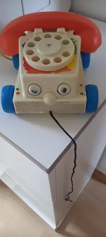 Donne téléphone en plastique (jouet enfant)
